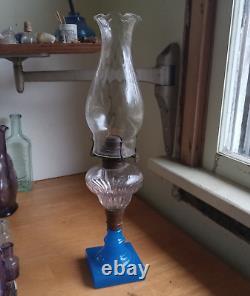 1870s PRISM FONT OIL LAMP WITH BLUE GLASS BASE & NICE SWIRLED GLASS CHIMNEY
