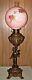 1880's Brass Cherub & Snake Detailed Ornate Electrified Oil Lamp with Pink Shade