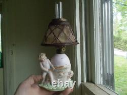 1890s ORIGINAL BISQUE CHERUBS & EGG MINIATURE OIL LAMP WITH BASKETWEAVE SHADE