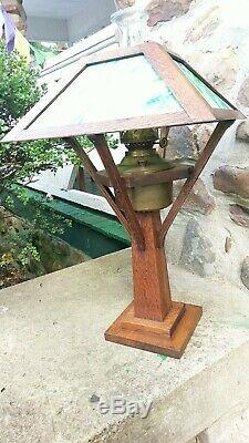 1910 W. B. Brown mission oak green slag glass table lamp, Miller oil lamp insert