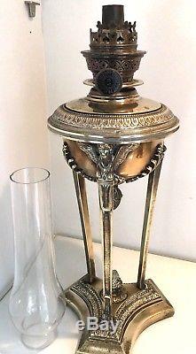19th century French Neoclassical style brass oil lamp, lion paw feet putti