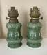 2 ANTIQUE KOSMOS BRENNER GREEN PORCELAIN OIL LAMP Floral Fleur De Lis 10 Tall