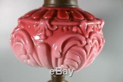 A Large Good Quality Cranberry Twin Duplex Table Oil Lamp