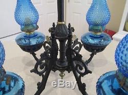 Antique Bradley Hubbard 1871 hanging wrought iron chandelier holding 4 oil lamps