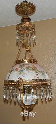 Antique Brass hanging oil lamp with glass chimney and floral glass shade