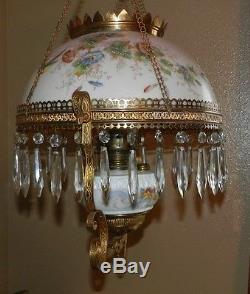 Antique Brass hanging oil lamp with glass chimney and floral glass shade
