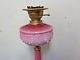 Antique. Converted Chamber oil lamp overlay ruby pink white glass