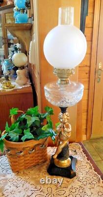 Antique Figure Oil Lamp, Flute Player, complete table lamp