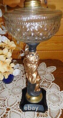 Antique Figure Oil Lamp, Flute Player, complete table lamp