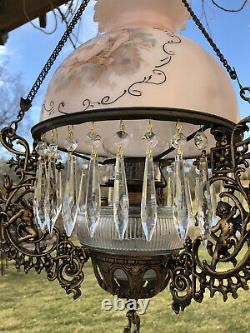 Antique Hanging Oil Lamp Cherub design in Iron Fixture
