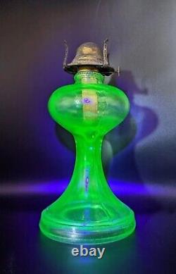 Antique Hourglass Shape Vaseline Uranium Glass Oil Lamp withBanner Burner Glows