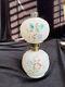 Antique Miniature oil lamp flower pattern withchimney. I have another one of these