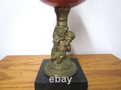 Antique Victorian Cherub Figure Oil Lamp withRed glass Bowl & Metal Base
