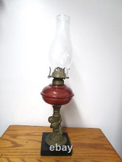 Antique Victorian Cherub Figure Oil Lamp withRed glass Bowl & Metal Base