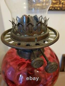 Antique Wright And Butler Ornate brass And Cranberry Glass Oil Lamp