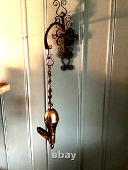 Antique bronze oil lamp with wall hook