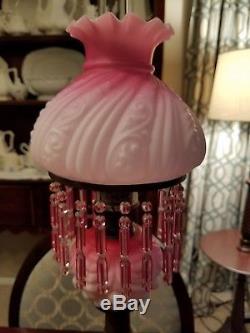Antique frosted glass oil lamp with hanging crystals