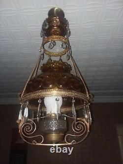 Antique hanging brass oil lamp