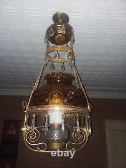Antique hanging brass oil lamp