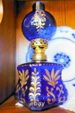 Antique miniature cobalt glass oil lamp with gilt embossing