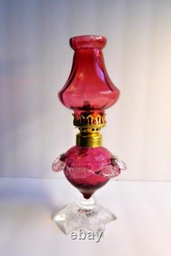 Antique miniature cranberry oil lamp