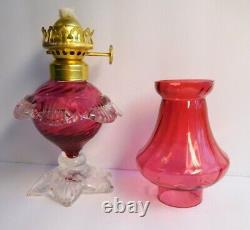 Antique miniature cranberry oil lamp