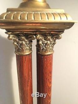 Antique oak four column and brass oil lamp base