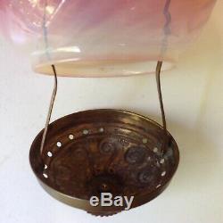 Antique ornate brass hanging hall oil lamp fixture with pink opalescent swirl s