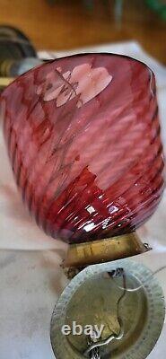 Beautiful antique brass hanging electrified oil lamp cranberry swirled shade