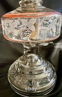 Etched glass pedestal base with Clear shade oil lamp