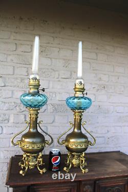 PAIR antique brass oil lamps mythological animals turquoise glass rare