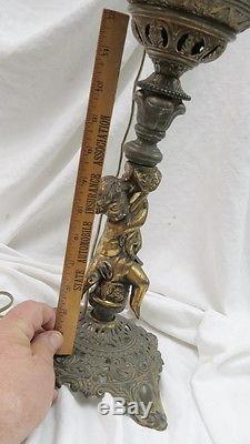 Signed Bradley & Hubbard converted figural banquet oil lamp / 23 tall nude boy