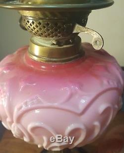 Stunning cranberry glass oil lamp