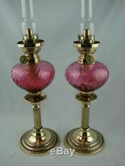 Superb Pair Of Brass Peg Oil Lamps, Swirled Cranberry Fonts, Burner, Chimney