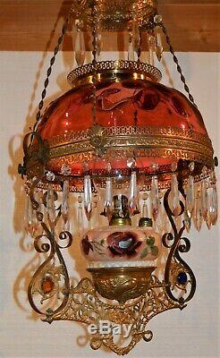 Victorian Cranberry Red Jeweled Pull Down Oil Lamp withCrystals Painted Font 1880s