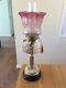Victorian Duplex oil lamp and Cranberry Shade