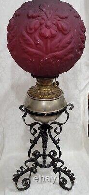 Victorian Gwtw Oil Lamp Consolid Iris Ruby Red Globe & Wrought Iron Ornate Base