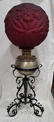 Victorian Gwtw Oil Lamp Consolid Iris Ruby Red Globe & Wrought Iron Ornate Base