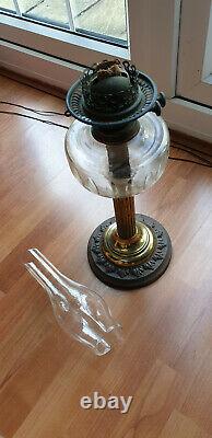 Victorian oil lamp cut glass font on brass column base double burner