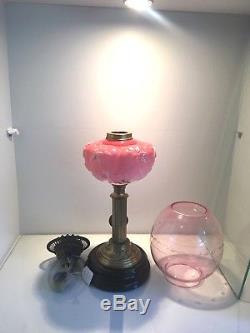 Victorian opaque pink glass and brass oil lamp